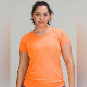 Lululemon Orange soda swiftly tech size 4